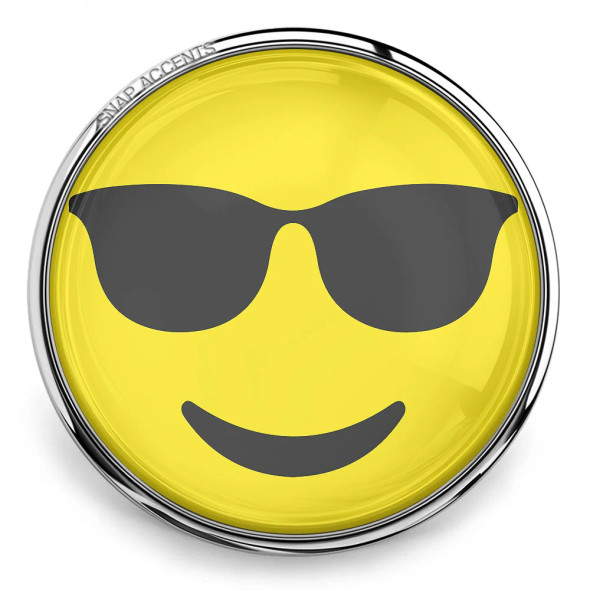 SnapAccents round snap jewelry charm featuring a yellow smiley face emoji with black sunglasses, polished silver-tone metal frame, trendy and fun accessory for interchangeable snap jewelry collections.