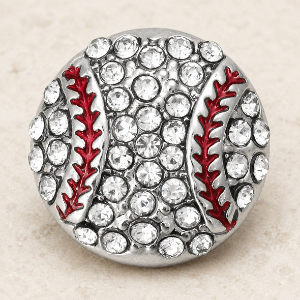 round snap jewelry charm designed as a baseball with clear rhinestones and red enamel stitching on a silver base