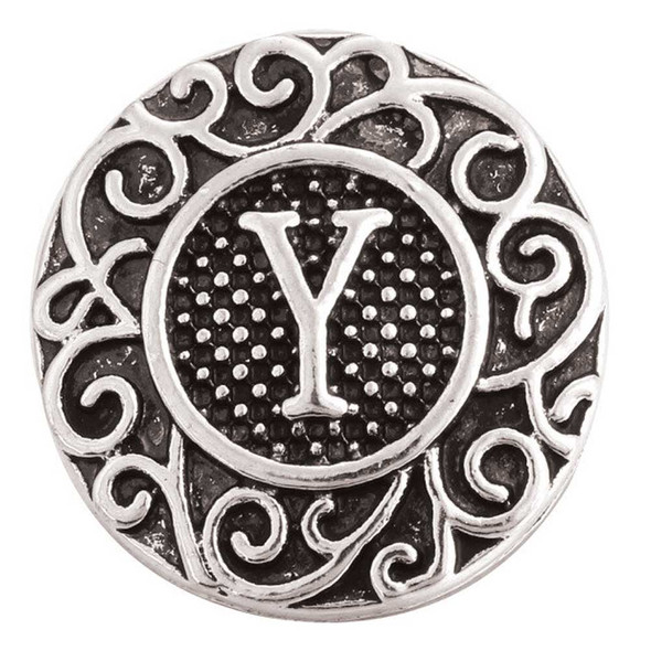 SnapAccents silver-tone snap jewelry charm with intricate scrollwork design and raised letter Y centerpiece, textured background, interchangeable accessory for bracelets and necklaces.