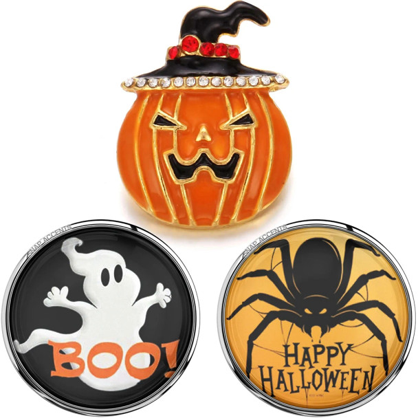 Halloween snap jewelry set featuring a grinning pumpkin with a witch hat adorned with red and clear rhinestones, a round snap charm with a white ghost and "BOO!" text on black background, and a round snap charm with a black spider and "Happy Halloween" text on an orange background. Perfect for festive Halloween accessories.