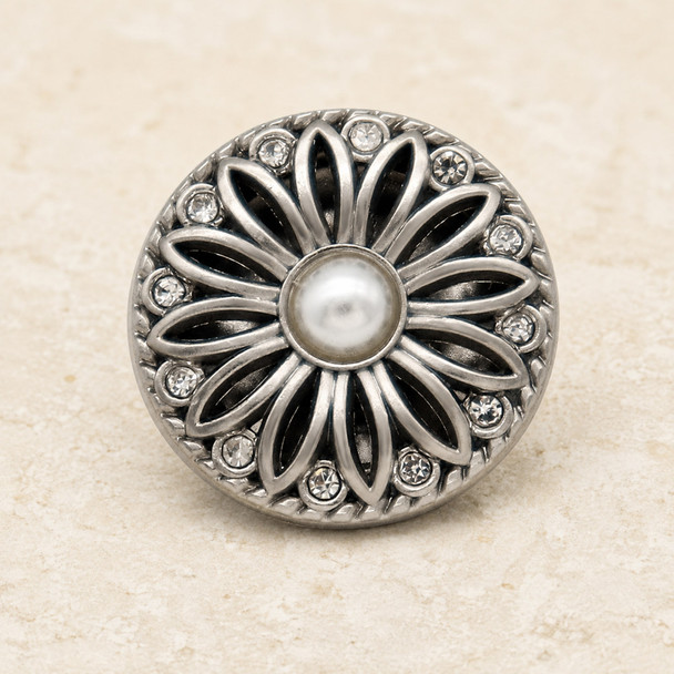 round silver snap jewelry charm with a daisy flower design featuring a white pearl center and clear rhinestones around the petals