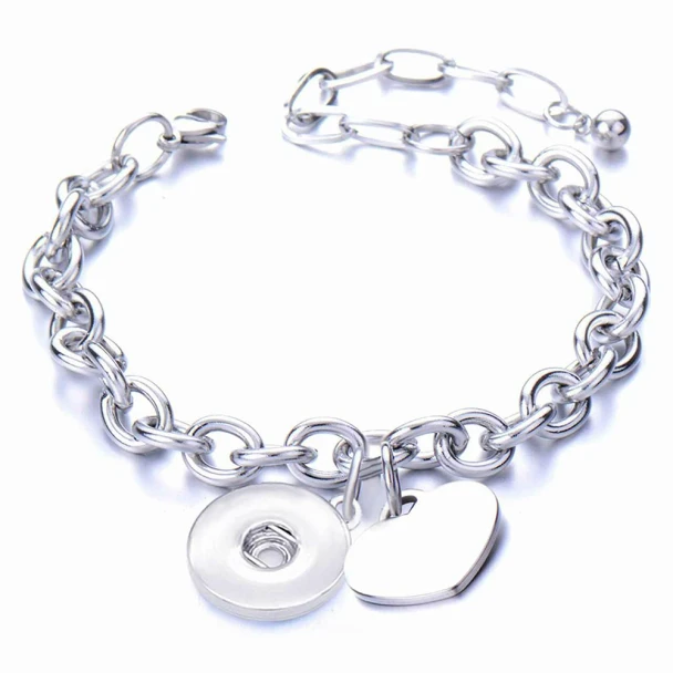 Silver chain link bracelet with interchangeable snap charms, featuring a round donut and heart-shaped charm, stylish customizable jewelry accessory by SnapAccents.