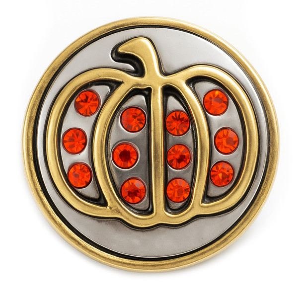 round snap jewelry charm with a brass pumpkin outline and bright orange rhinestones on a silver background