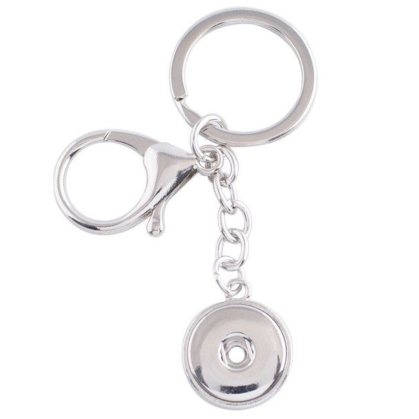 Silver-tone SnapAccents snap jewelry keychain with lobster clasp and split ring, designed to hold interchangeable snap buttons for customizable accessories, perfect for personalized gifts and fashion statements.