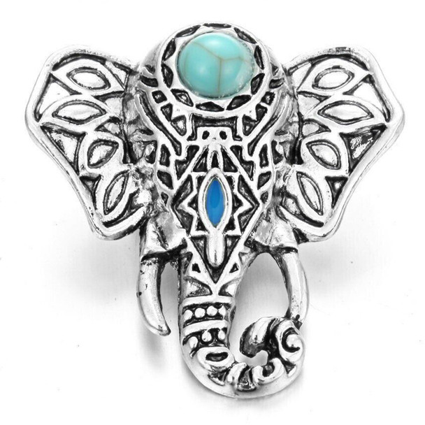Elephant-shaped snap jewelry charm with intricate silver detailing, a turquoise stone on the forehead, and a blue accent in the center.