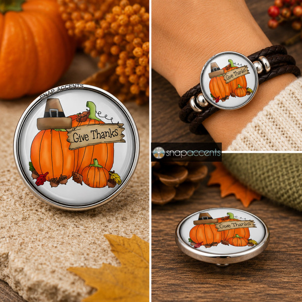 snap jewelry charm with two orange pumpkins, a pilgrim hat, autumn leaves, and a wooden sign reading Give Thanks in black text