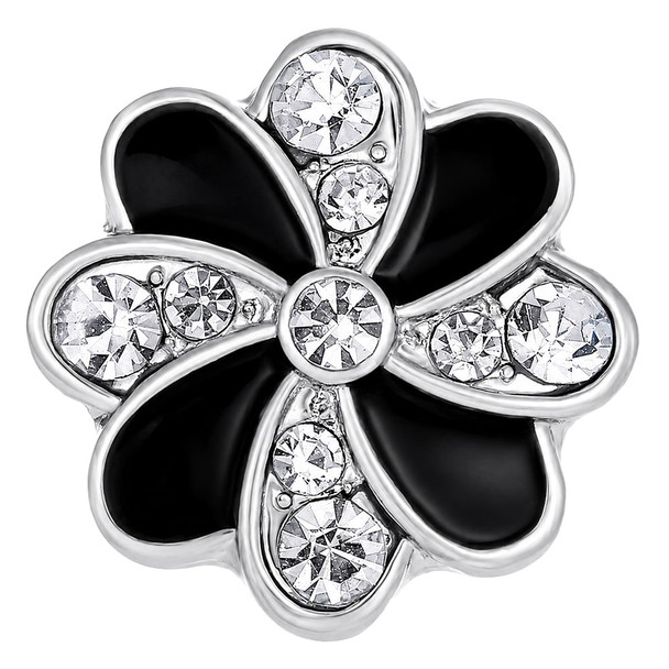 silver-tone snap jewelry charm shaped like a flower with alternating black enamel and clear rhinestone petals