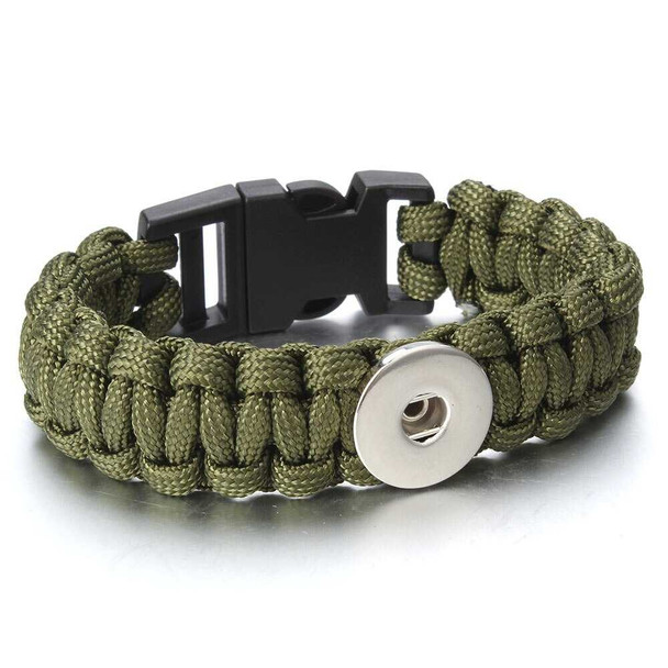 Olive green paracord snap bracelet with black plastic buckle and silver-tone snap button base, adjustable outdoor survival style wrist accessory for interchangeable snap charms.