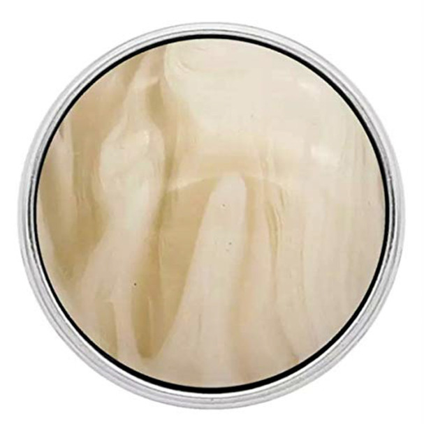 round cream-colored snap jewelry charm with smooth surface and subtle marble-like veining
