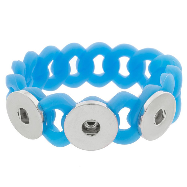 Blue silicone snap bracelet with three silver-tone snap button settings, adjustable and flexible fashion accessory for interchangeable snap charms, trendy unisex jewelry piece for casual wear.