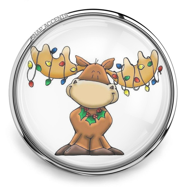 round snap jewelry charm featuring a cartoon moose with colorful Christmas lights on antlers and a holly decoration on its chest