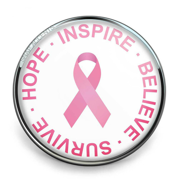 round snap jewelry charm with a pink breast cancer ribbon in the center and the words HOPE INSPIRE BELIEVE SURVIVE in pink around the edge