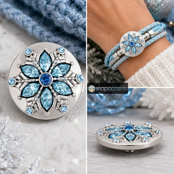 round silver snap jewelry charm with a blue rhinestone snowflake design featuring marquise and round stones, shown loose and on a light blue braided bracelet