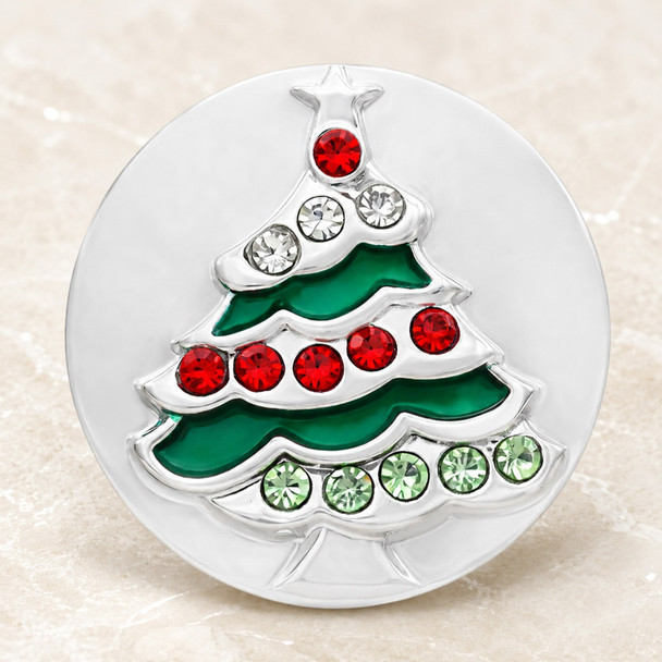 Round silver snap jewelry charm featuring a Christmas tree design with green enamel and red, white, and light green rhinestones
