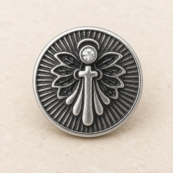 round silver snap jewelry charm with a cross and angel wings design featuring a clear rhinestone at the top center