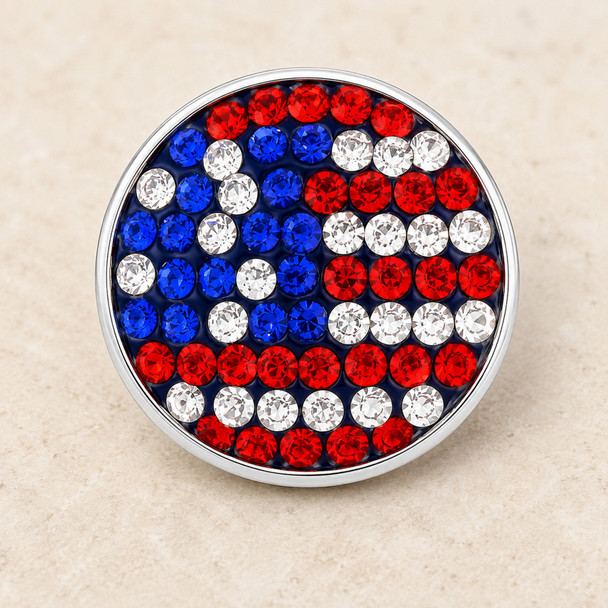round snap jewelry charm with red, white, and blue rhinestones arranged to resemble the American flag