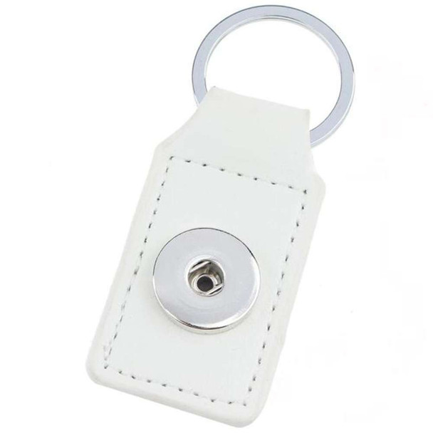 White leather SnapAccents snap jewelry keychain with silver-tone metal snap button and key ring, customizable accessory for interchangeable snap charms, stylish and durable gift idea.