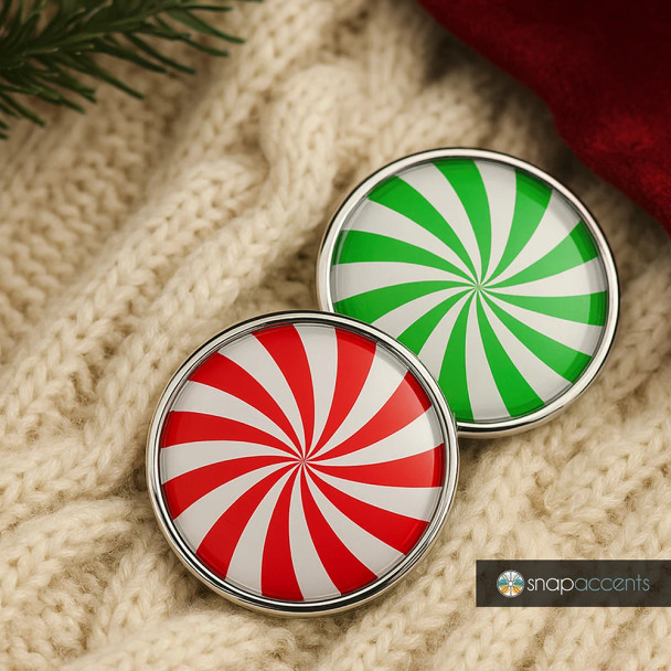 SnapAccents holiday snap jewelry buttons featuring red and white and green and white peppermint swirl designs, round metal snap charms, festive Christmas accessories, decorative interchangeable jewelry pieces on cozy knit background.