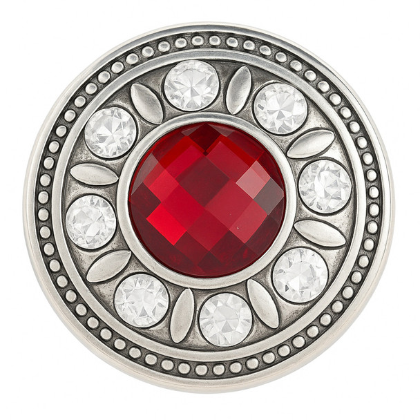 round snap jewelry charm with a large faceted red center stone surrounded by clear rhinestones and silver leaf accents on a silver-tone base