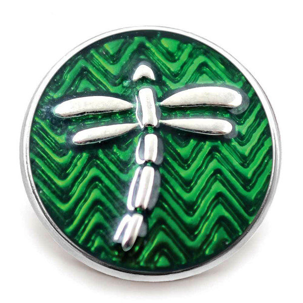 green snap jewelry charm with silver dragonfly over textured chevron background
