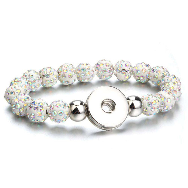 White beaded snap bracelet with iridescent rhinestones and silver snap button charm, adjustable stretch jewelry for interchangeable snap accents, stylish accessory for women and girls.