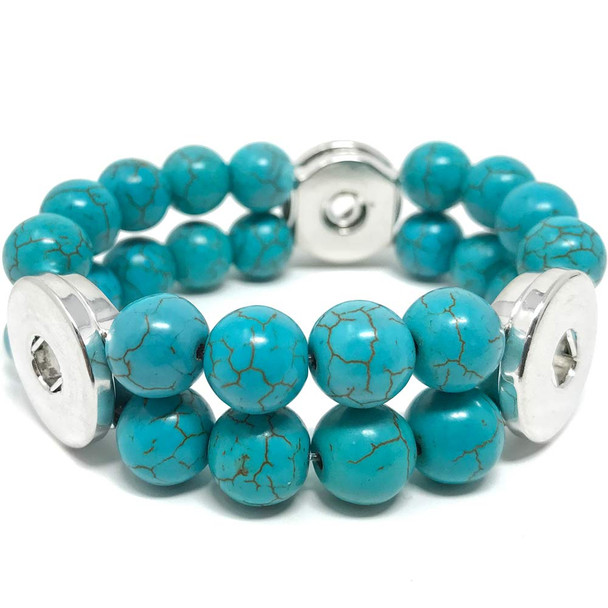 Turquoise blue double-strand beaded bracelet with silver snap button accents, adjustable snap jewelry accessory, handmade natural stone stretch bracelet for women, boho chic fashion jewelry, versatile snap charm compatible wristband.