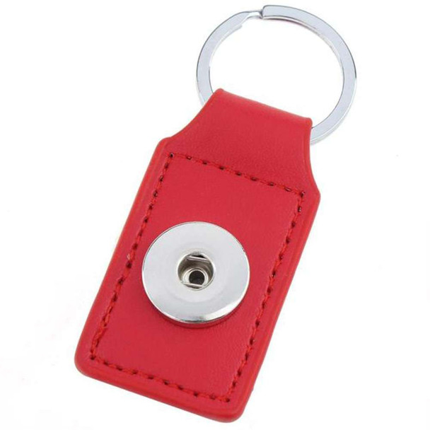 Red leather SnapAccents keychain with silver snap button for interchangeable snap jewelry charms, durable stitching, and metal keyring accessory.