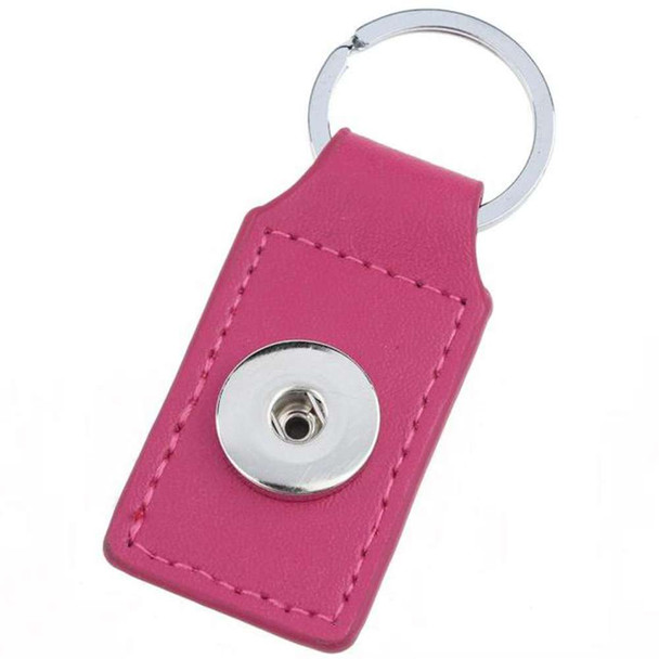 Pink leather snap button keychain with silver metal ring, compatible with interchangeable SnapAccents snap jewelry buttons, stylish and durable accessory for personalized key organization or bag decoration.