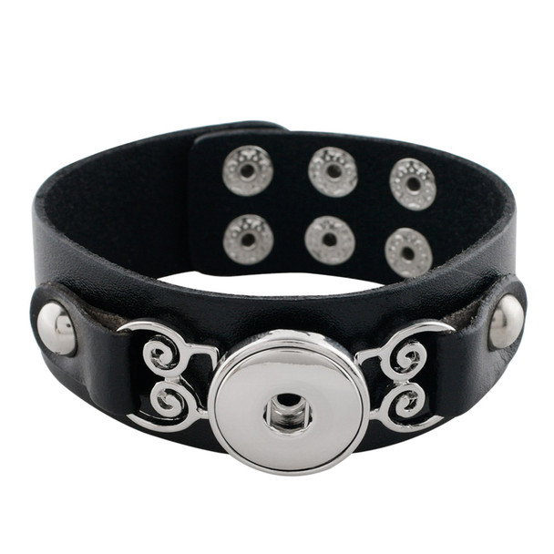 black leather cuff snap bracelet with silver scroll accents and adjustable snap closures