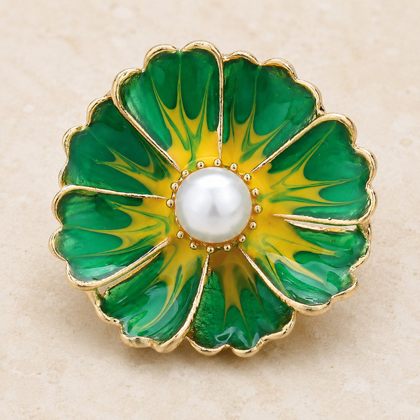 green and yellow flower snap jewelry charm with a white pearl center and gold edging
