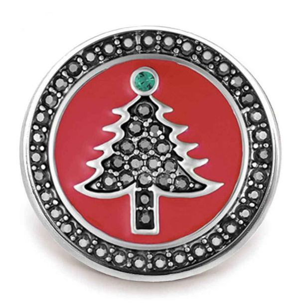 Round snap jewelry charm with a red background featuring a black rhinestone Christmas tree and a single green rhinestone at the top, surrounded by black rhinestones