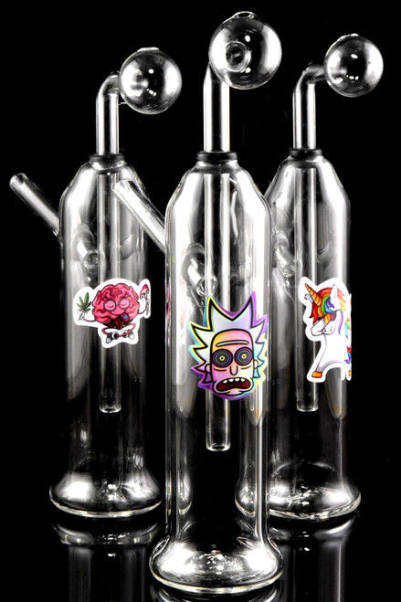 Wholesale clear glass oil burner rigs with unique cartoon decals.