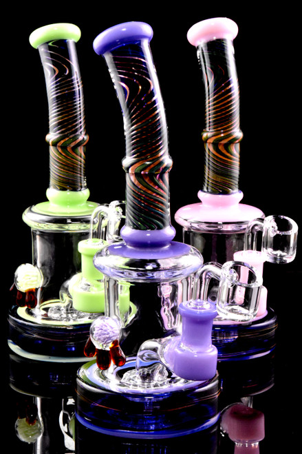 Bulk purchase slime colored dab rigs for head shop resale.