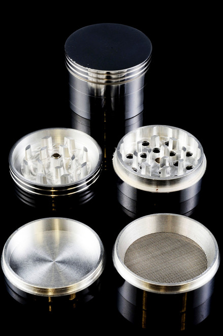 Two silver aluminum 50mm grinders for head shop resale.
