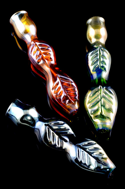 Wholesale shiny leaf design glass chillums for head shop resale.