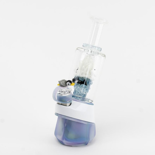 Attachment mounted on an e-rig to demonstrate fit and stance, penguin cap on atomizer; glass art display for head-shop wholesale.