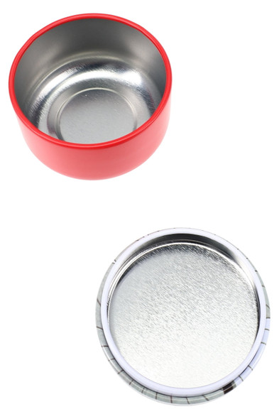 wholesale metal herb jar, side angle showing colorful printed lid and 2-inch cylinder body ready for smoke-shop shelves