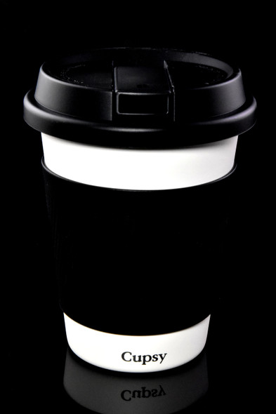 Cupsy disguised water pipe with closed black lid and white cup body, straight-on studio angle—retail smoke shop novelty.
