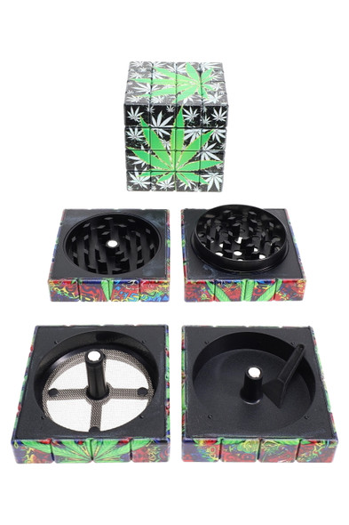2" cube grinder disassembled, green leaf graphic; metal teeth, mesh screen and scraper visible; wholesale white-background shot.