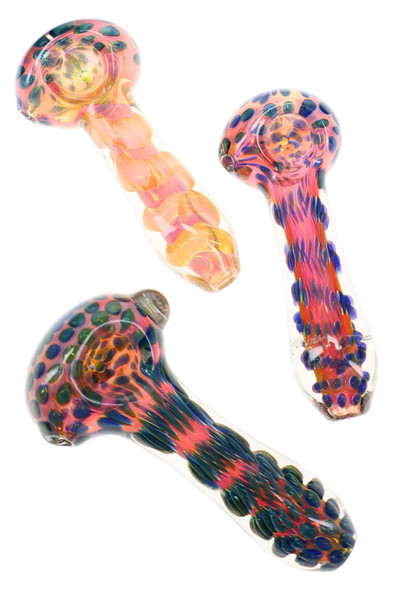 Three assorted 4.5" gold fumed glass spoon pipes with colorful dotted bowls, spiral details, and varied accent colors