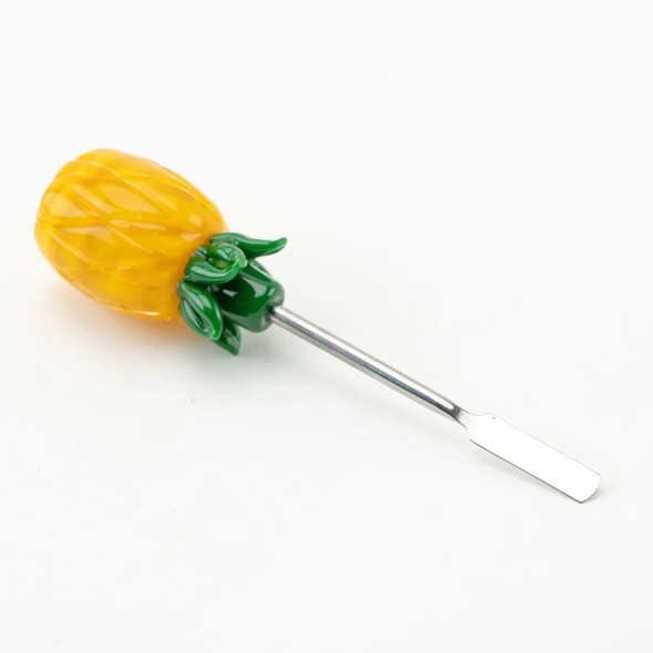Head-shop supplies pineapple dabber lying on white backdrop, stainless steel spatula tip visible, 4.5-inch novelty tool