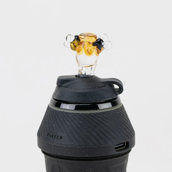 Bee Hive Proxy glass ball cap installed on Puffco device; amber honey top with bee details, close white view for wholesale listings.