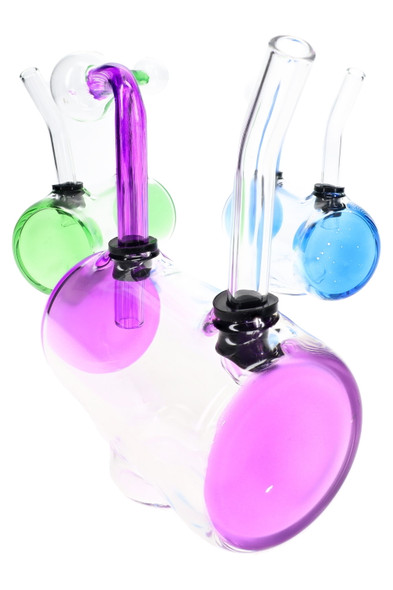 Three 4.5" colorful barrel glass oil burner rigs for wholesale smoke shop displays in purple, blue, and green