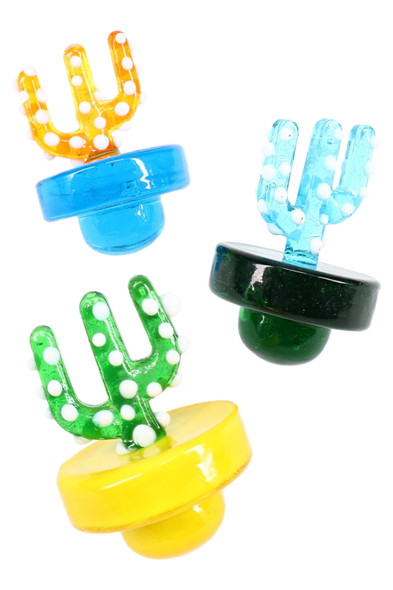 Trio of glass cactus carb caps—green/yellow, orange/blue, teal/black—1.5-inch wholesale dab accessory, colored glass, angled view on white.