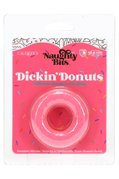 Pink silicone donut cock ring on sprinkles card, peggable retail pack, left-front angle—wholesale adult boutique inventory item.