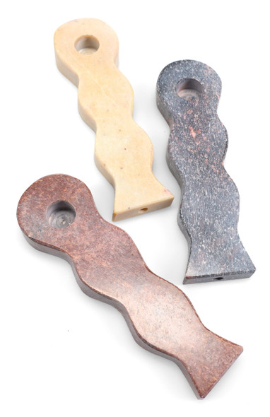 Top-down view of three 4" curvy stone hand pipes in brown, cream, and gray marble tones; sturdy wholesale head-shop spoon style on white background. Top-down view of three 4" curvy stone hand pipes in brown, cream, and gray marble tones; sturdy wholesale head-shop spoon style on white background.