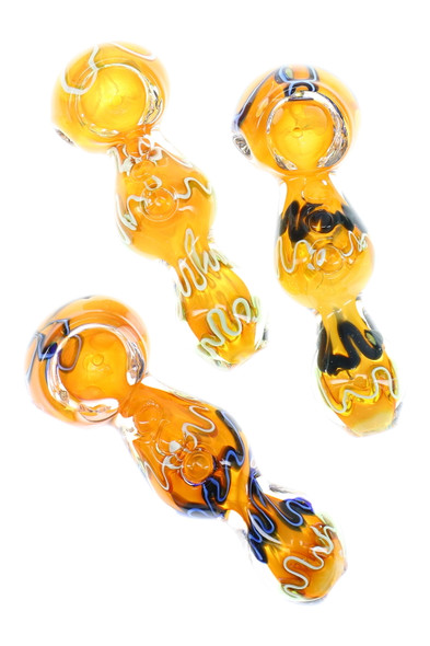 Wholesale 3.5" gold-fumed glass spoon pipes with multicolor squiggle striping and thumb indents, assorted designs, top-down trio view for retail cases. Wholesale 3.5" gold-fumed glass spoon pipes with multicolor squiggle striping and thumb indents, assorted designs, top-down trio view for retail cases.