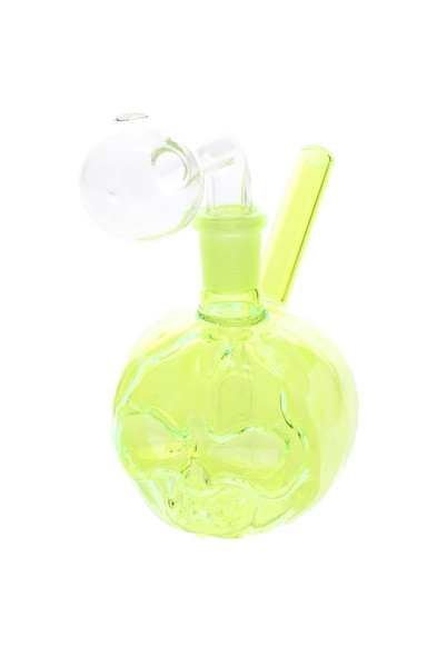 Neon green 3.5" pumpkin skull glass oil burner rig with clear dome and angled neck—ideal for wholesale smoke shop case presentations.