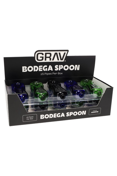 Wholesale GRAV Bodega Spoon 4" glass hand pipes in a 15-piece retail display box, assorted black, blue, green colors, front angle view.