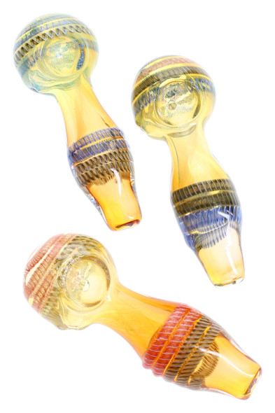 Gold-fumed 4" color-changing glass spoon pipes with multicolor stripes; trio on white, retail head-shop wholesale product photo, compact pocket size.